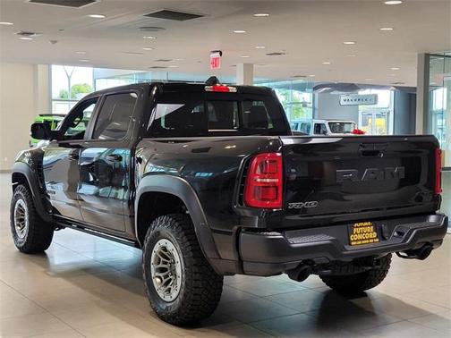 Diamond Black Crystal Pearlcoat 2026 RAM 1500 RHO Crew Cab 4x4 5'7' Box