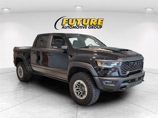 Diamond Black Crystal Pearlcoat 2026 RAM 1500 RHO Crew Cab 4x4 5'7' Box