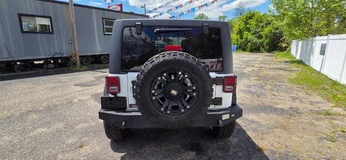 White 2014 Jeep Wrangler Unlimited Sport