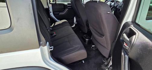 White 2014 Jeep Wrangler Unlimited Sport