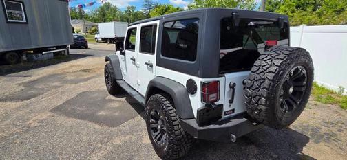 White 2014 Jeep Wrangler Unlimited Sport
