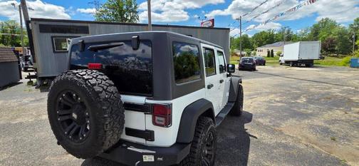 White 2014 Jeep Wrangler Unlimited Sport