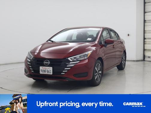 Red 2025 Nissan Versa SV