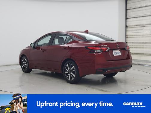 Red 2025 Nissan Versa SV