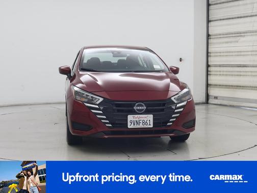 Red 2025 Nissan Versa SV