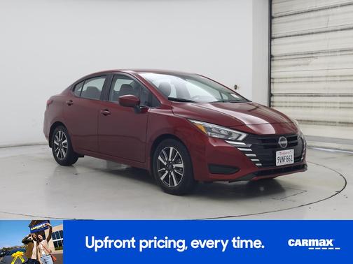 Red 2025 Nissan Versa SV