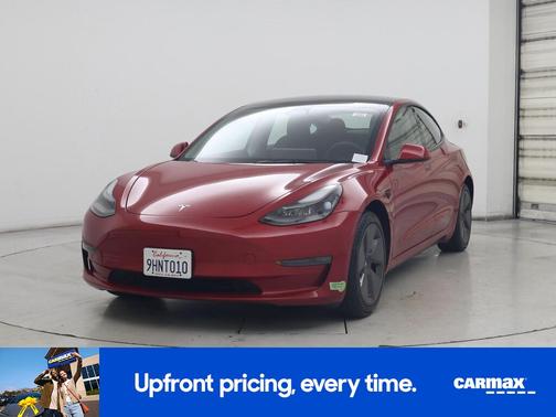 Red 2023 Tesla Model 3 Long Range