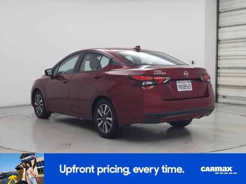 Red 2024 Nissan Versa SV