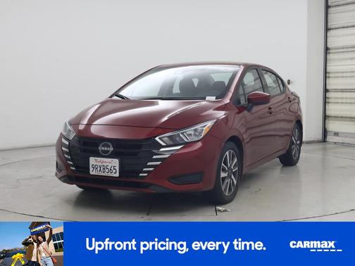 Red 2024 Nissan Versa SV