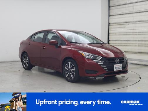 Red 2024 Nissan Versa SV