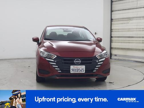 Red 2024 Nissan Versa SV