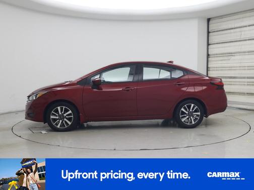 Red 2024 Nissan Versa SV