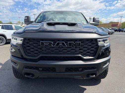 Diamond Black Crystal Pearlcoat 2026 RAM 1500 RHO Crew Cab 4x4 5'7' Box