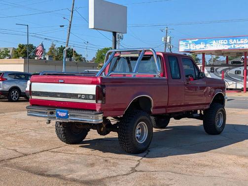 Red 1995 Ford F-150 Short Bed