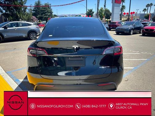 Solid Black 2024 Tesla Model Y Long Range Dual Motor All-Wheel Drive
