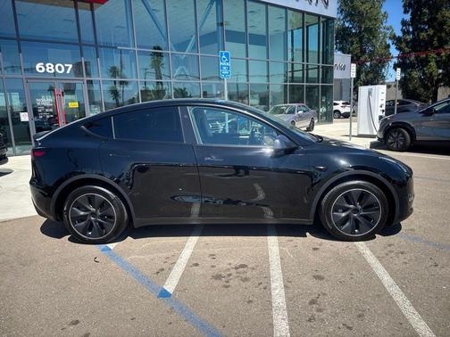 Solid Black 2024 Tesla Model Y Long Range Dual Motor All-Wheel Drive