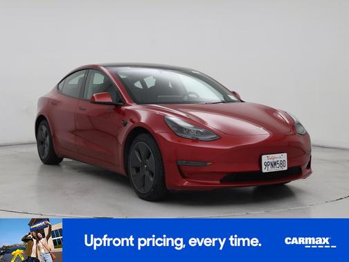 Red 2023 Tesla Model 3