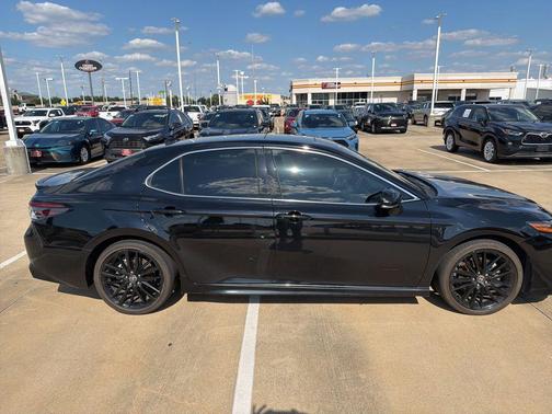 Midnight Black Metallic 2024 Toyota Camry Hybrid SE