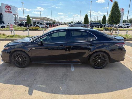 Midnight Black Metallic 2024 Toyota Camry Hybrid SE