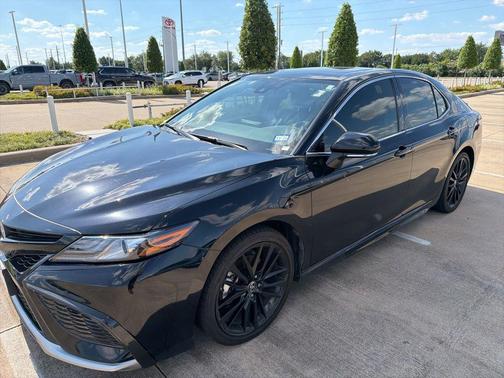 Midnight Black Metallic 2024 Toyota Camry Hybrid SE