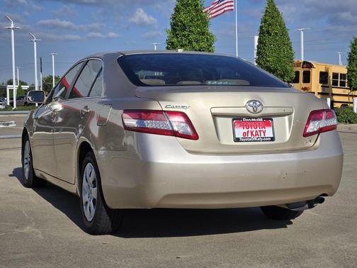 Sandy Beach Metal 2010 Toyota Camry LE