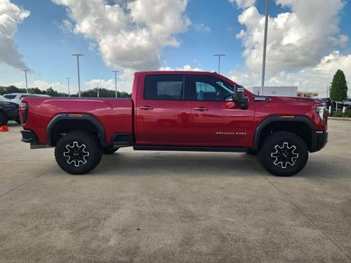 Volcanic Red Tintcoat 2026 GMC Sierra 2500 AT4X