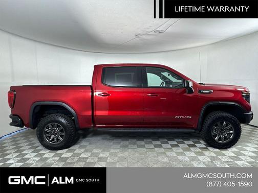 Volcanic Red Tintcoat 2026 GMC Sierra 1500 AT4X