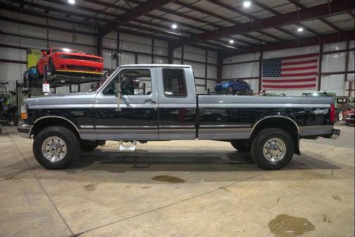 Black 1997 Ford F-250 XLT SuperCab H/D
