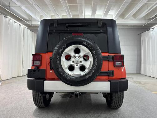 Sunset Orange Pearlcoat 2015 Jeep Wrangler Unlimited Sahara