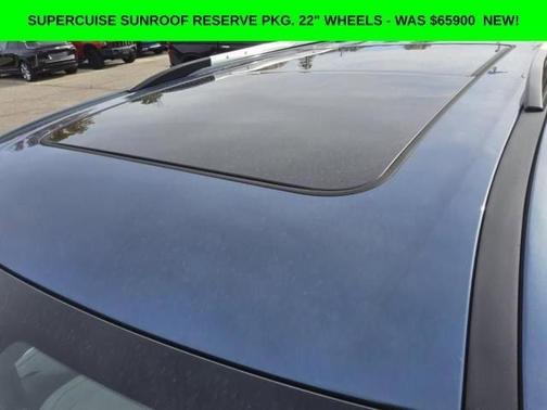 Blue 2025 GMC Acadia Denali