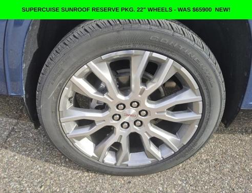 Blue 2025 GMC Acadia Denali