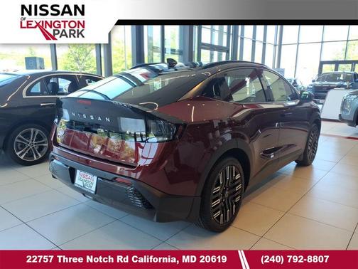 Coulis Red Metallic/Black 2026 Nissan Leaf PLATINUM+