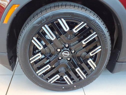 Coulis Red Metallic/Black 2026 Nissan Leaf PLATINUM+