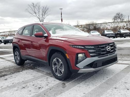 Red 2026 Hyundai TUCSON Hybrid Blue SE