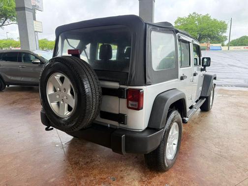 Bright Silver Metallic Clearcoat 2011 Jeep Wrangler Unlimited Sport
