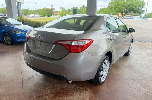 Brown 2015 Toyota Corolla LE