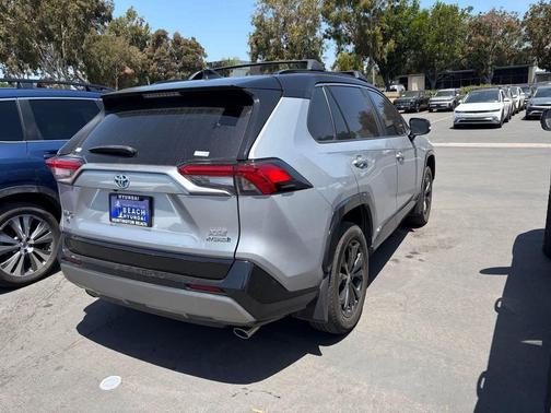 Silver Sky Metallic/Midnight Black Metallic 2024 Toyota RAV4 Hybrid SE