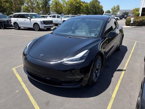 Solid Black 2021 Tesla Model 3 Standard Range Plus