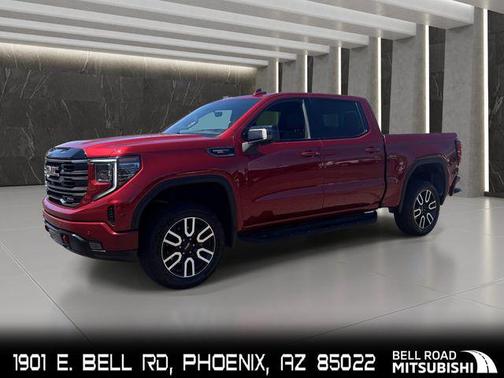 Volcanic Red Tintcoat 2025 GMC Sierra 1500 AT4