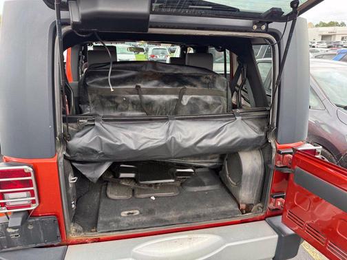 Sunburst Orange Pearl 2009 Jeep Wrangler Unlimited Sahara