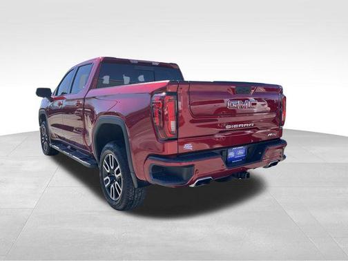 Volcanic Red Tintcoat 2024 GMC Sierra 1500 AT4