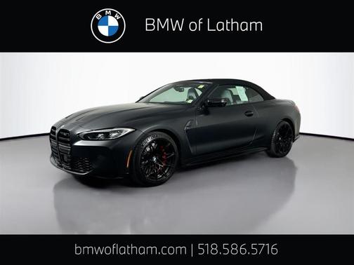 Black Sapphire Metallic 2024 BMW M4 Competition xDrive