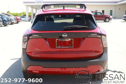 Scarlet Ember Tintcoat 2026 Nissan Kicks SR