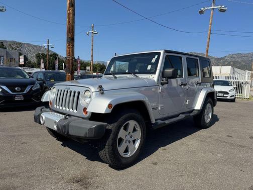 Bright Silver Metallic 2010 Jeep Wrangler Unlimited Sahara