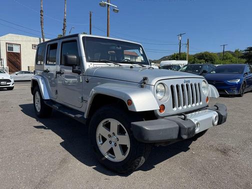 Bright Silver Metallic 2010 Jeep Wrangler Unlimited Sahara