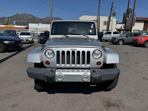 Bright Silver Metallic 2010 Jeep Wrangler Unlimited Sahara