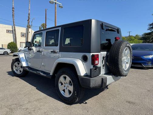 Bright Silver Metallic 2010 Jeep Wrangler Unlimited Sahara