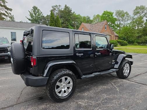 Black 2013 Jeep Wrangler Unlimited Sahara