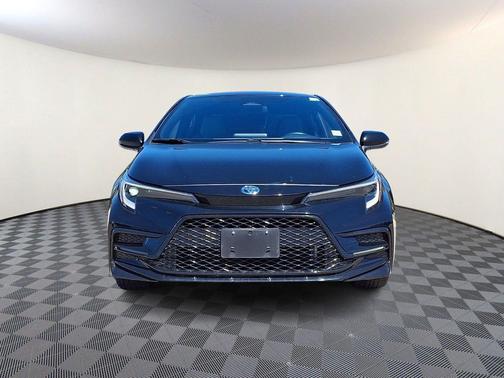 Midnight Black Metallic 2024 Toyota Corolla Hybrid SE