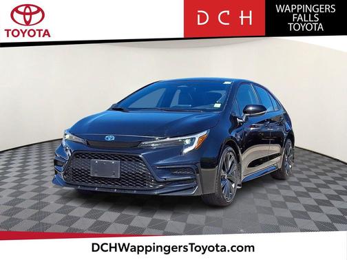 Midnight Black Metallic 2024 Toyota Corolla Hybrid SE